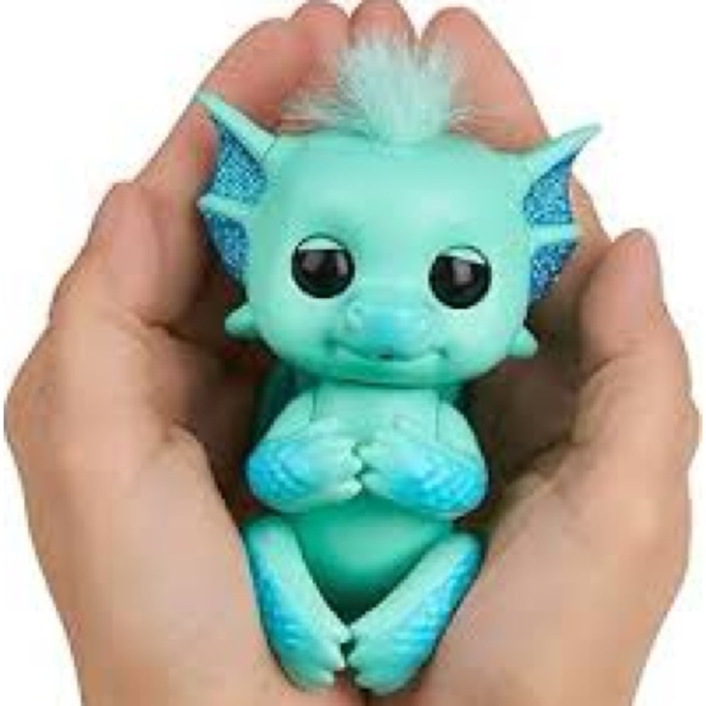 Wowee Fingerlings Baby Noa Glitter Dragon green blue interactive electronic toy